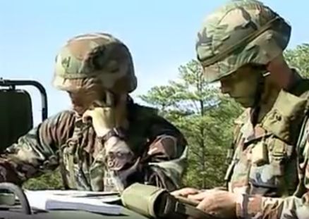 Senior Infantry Sergeant coordinating support via radio