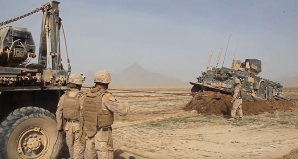 Soldiers recovering a vehicle