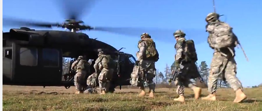 Soldiers boarding a helicopter